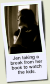 Jen taking a break from her book to watch the kids.